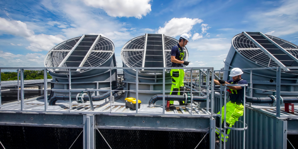 cooling tower workers in hazard gear